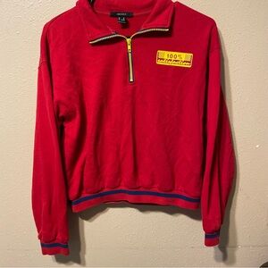 Red long sleeve with yellow accents “100% satisfaction”